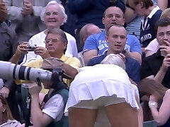 Sweat-soaked tennis babe bending over after match