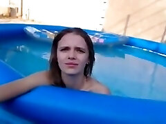School chick with small boobs gets fucked in the pool