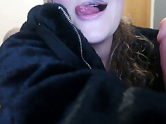 Beautiful white woman does a handsome blowjob while smoking