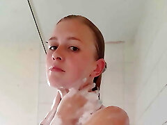 Hot blonde takes a shower