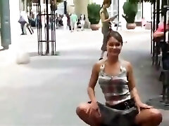 Girl demonstrating and pissing in public part 1