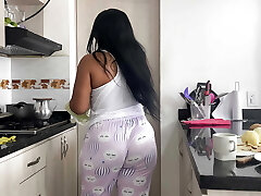 MILF stepmother enjoys making breakfast and pulverizing her big cock stepson.