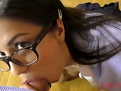 Pretty ultra-cute Julia De Lucia doesn't take off her uniform while giving feet wank