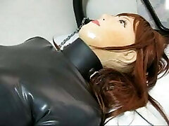 Female rubber mask in breathplay