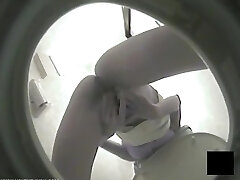 Office girl is tugging in toilet
