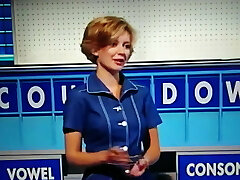 Sexy Quiz host in display stockings top