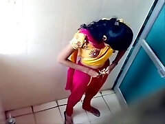Hidden camera clip with Indian girls pissing in a restroom