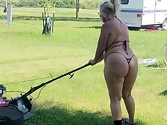 Got back to find wifey mowing in a panty bikini, her ass and thighs jiggling with every step 