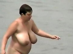 Big-boobed and fat mature nudist