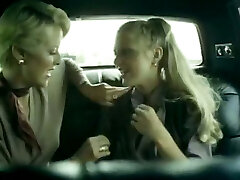 Naughty lesbians are having fuck-a-thon in the back of a cab