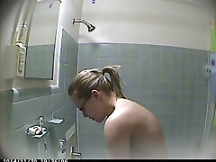 Check out hidden cam of my own wife taking a bathroom and flashing tits