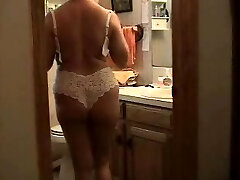 Obese Mama Strips For Camera