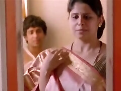 Hot Indian housewife vigorously kisses her husband
