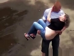Drunk woman pissing in the parking