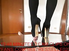 Mistress Elle in high heels thigh boots penetrate her slaves beef whistle