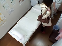 Voyeur massage video of cute Asian drilled with fingers