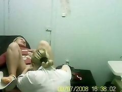 Hidden web cam video of blonde female on the gynecologist chair in the hospital