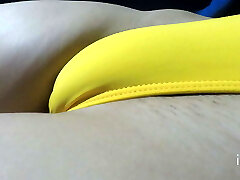 I allowed to my b to take off my cutoffs to record my swollen muff in a tight yellow bathing suit.