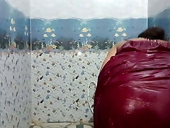 Indian young bhabhi bathing in petticoat tub