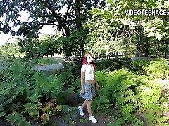 18 year adorable girl outdoor with mini skirt