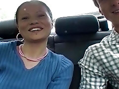 Fantastic brunette teen sucking a hard cock in the car