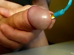 Close up silicon bead cock insertion, Inexperienced cum shot