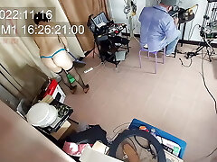 A naked maid is cleaning up in an doofy IT engineer's office. Real camera in office. 