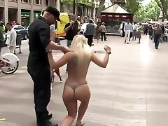 Tied up huge-boobed Spanish blonde on the beach