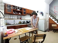 Ravioli Time! A naked housekeeper works in the hotel kitchen. Depraved housekeeper works in the kitchen sans undies.