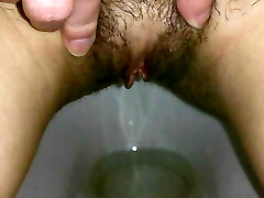 Russian domme piss in your mouth, fur covered pussy, close up pissing girl
