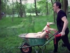 Young sub get tied up and penetrated in the garden