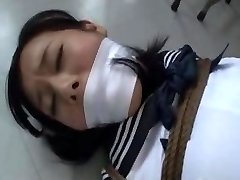 Japanese schoolgirl kidnapped and tied