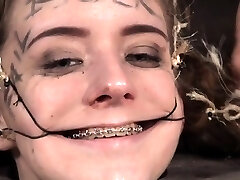 Teen gimp dominated with open mouth gags