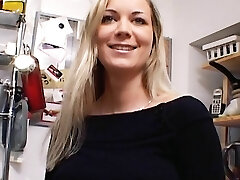 Unbelievable German Cougar with huge boobs dildoing her shaved muff in the kitchen