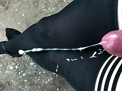 Crossdresser outdoor with mega handsfree pop-shot on nylons