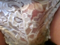 Peeing in a pair of lace underpants Peeing in a pair of lace underpants