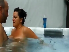 Mature couple having an amazing sex experience in their pool