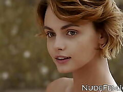 Cool redhead teases with her natural tits and soft pussy