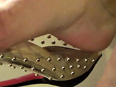 Mature feet tired and sweaty in transparent shoes