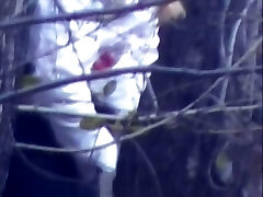 Public hidden cam captures a sexy girl peeing in the woods