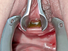 pee hole fucking with toothbrush and insertion of lengthy metal chain into her bladder