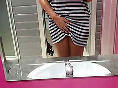 Horny teen in public toilet – so crazy she opens her pussy