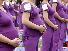 Pregnant Asian gals doing yoga (non porn)