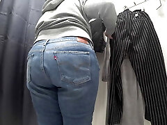 In a fitting apartment in a public shop, the camera caught a chubby milf with a gorgeous ass in transparent underpants. PAWG.
