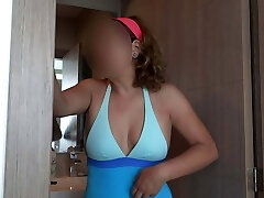 58-year-old Latina wife shows off in swimsuit on the beach