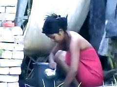 wow... outstanding desi village damsel bathing outside wow... outstanding desi village damsel bathing outside