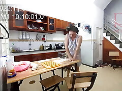 Ravioli Time! A naked housekeeper works in the motel kitchen. Depraved housekeeper works in the kitchen sans panties.