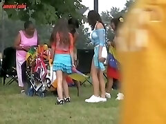 Sexy booty cut-offs video of a huge-chested chick enjoying a festival