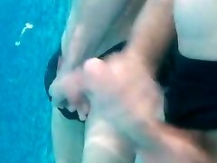 caught giving his swim buddy a hand job in the pool