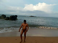 Indian twink bare in public on the beach